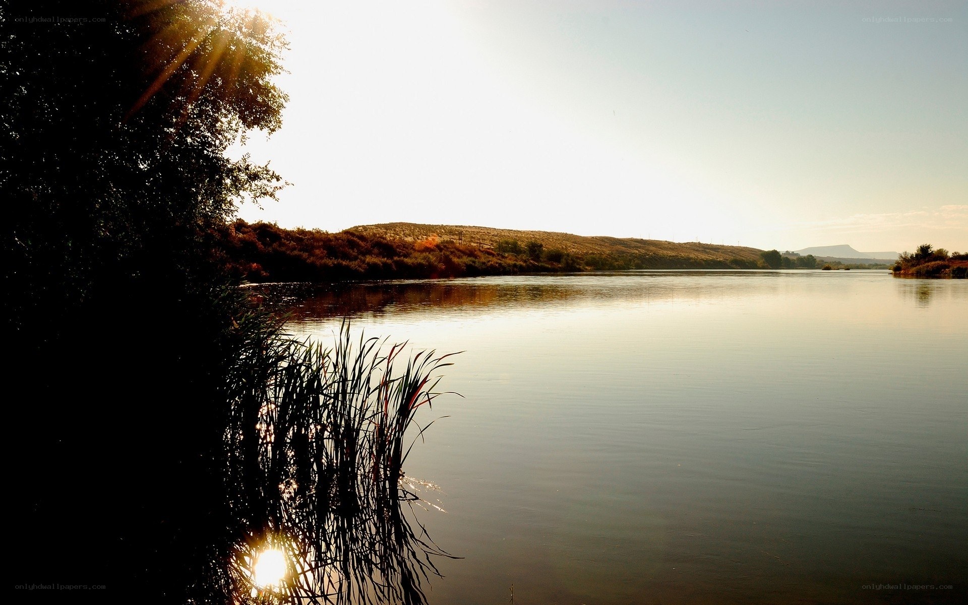 Sunset over a calm river
