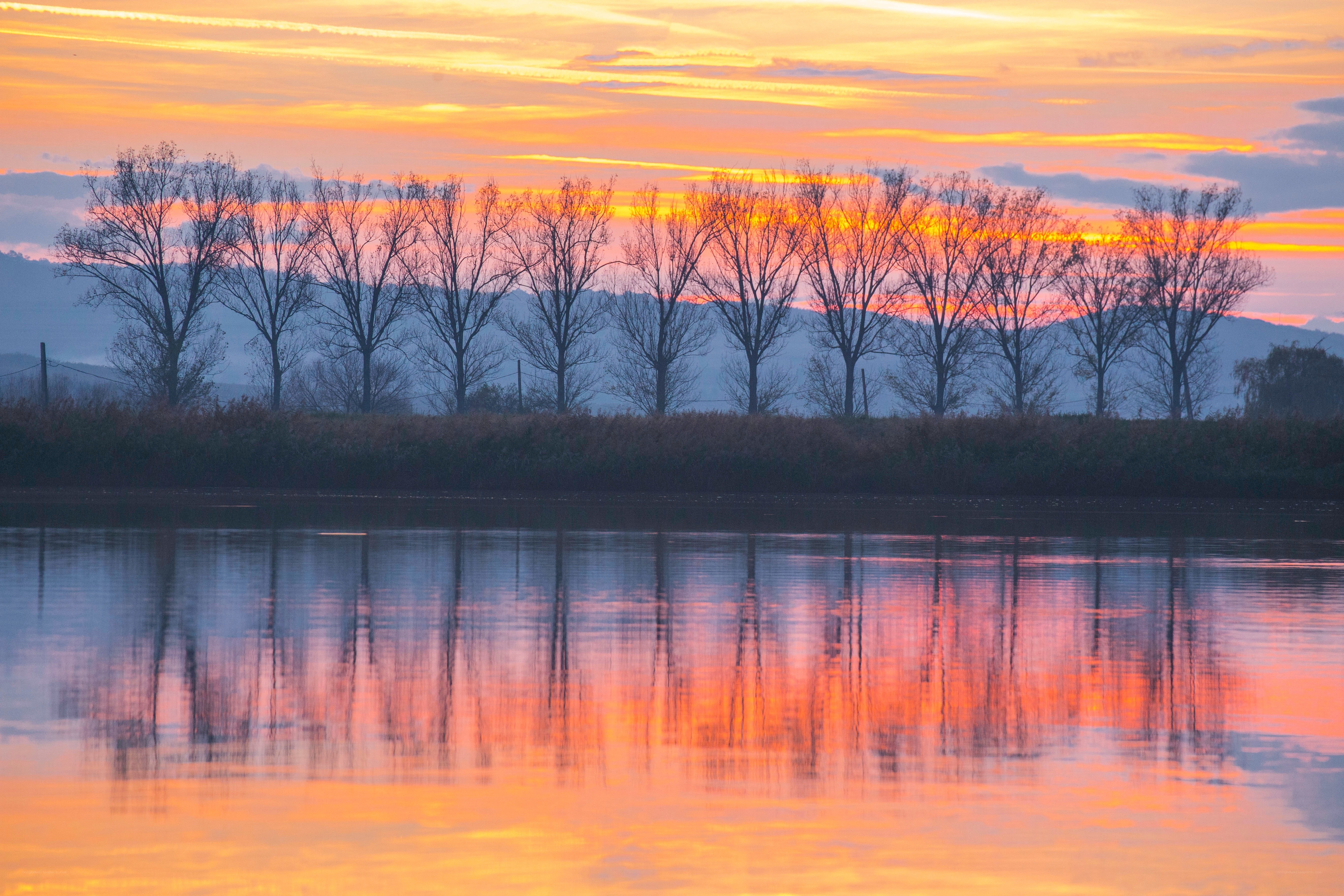 Sunset over a calm river
