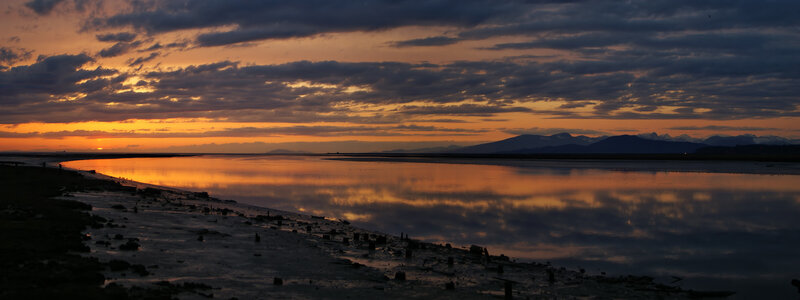 Sunset over a calm river