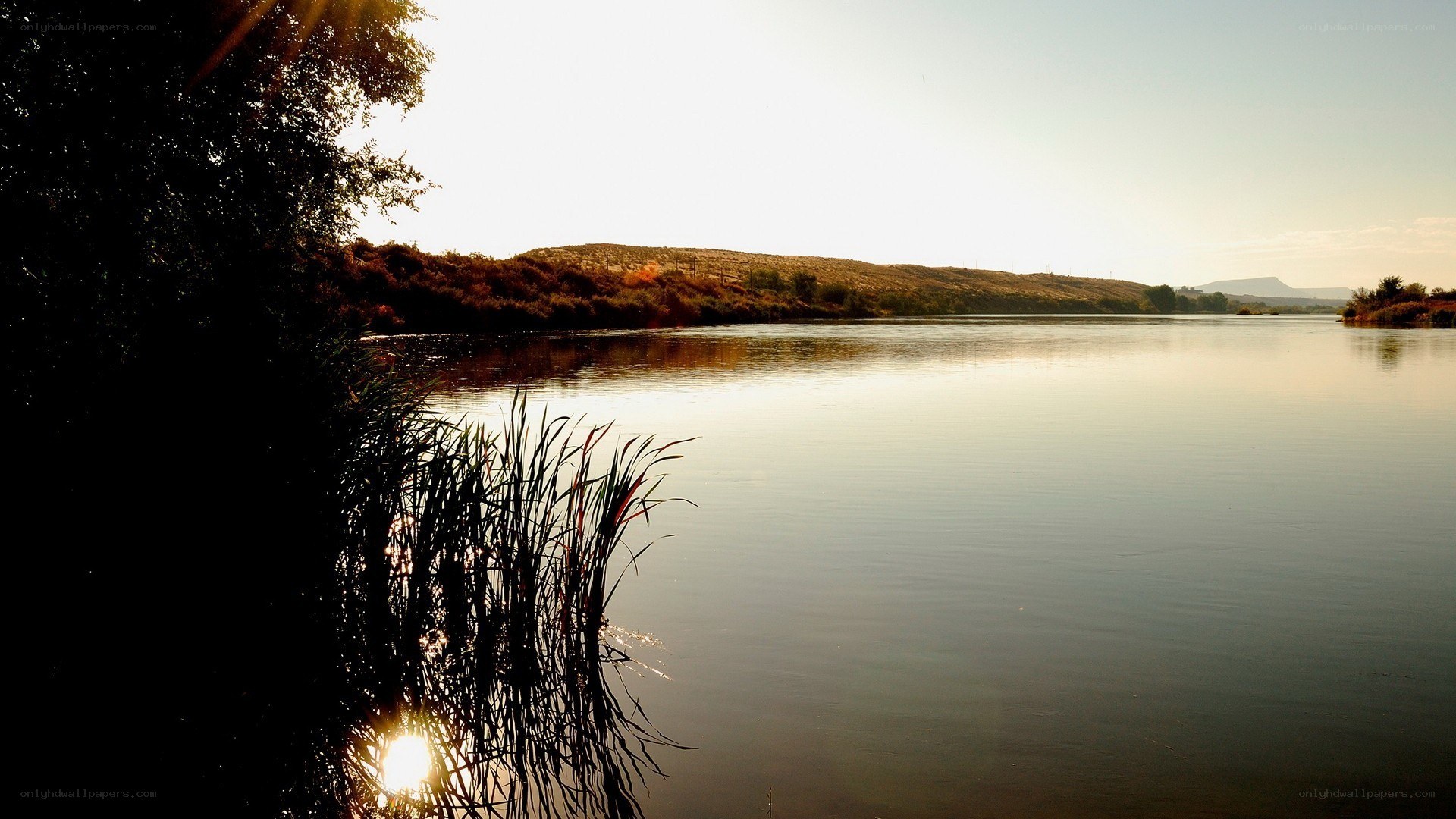 sunset over a calm river