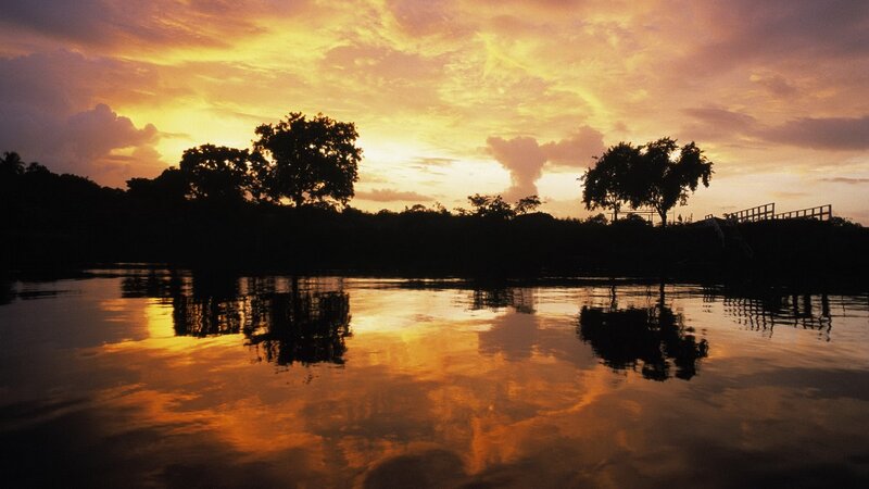 sunset over a calm river