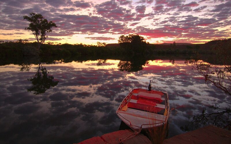 Sunset over a calm river