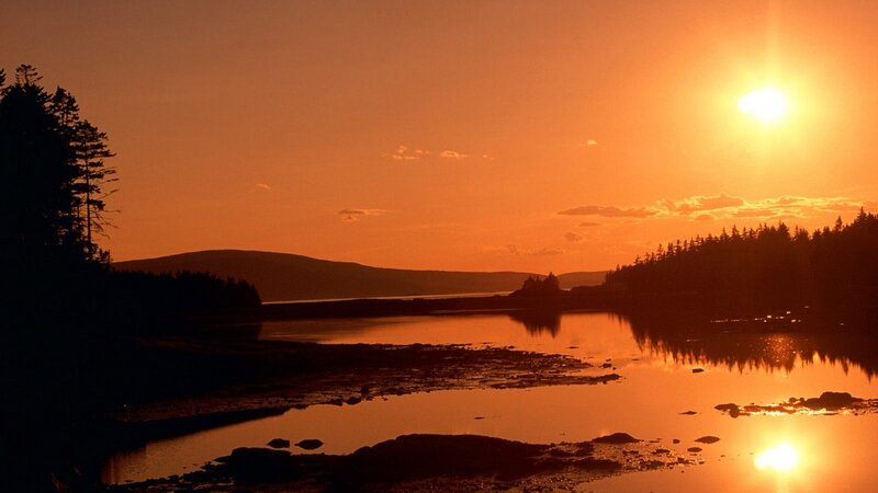 sunset over a calm river