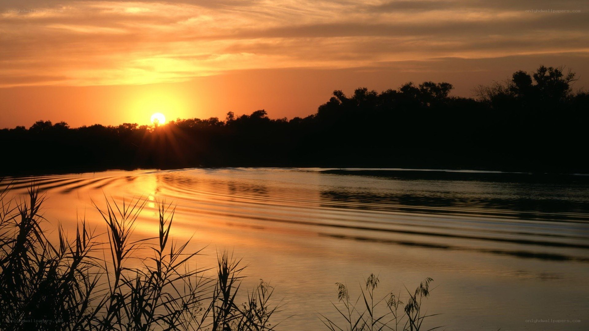 Sunset over a calm river