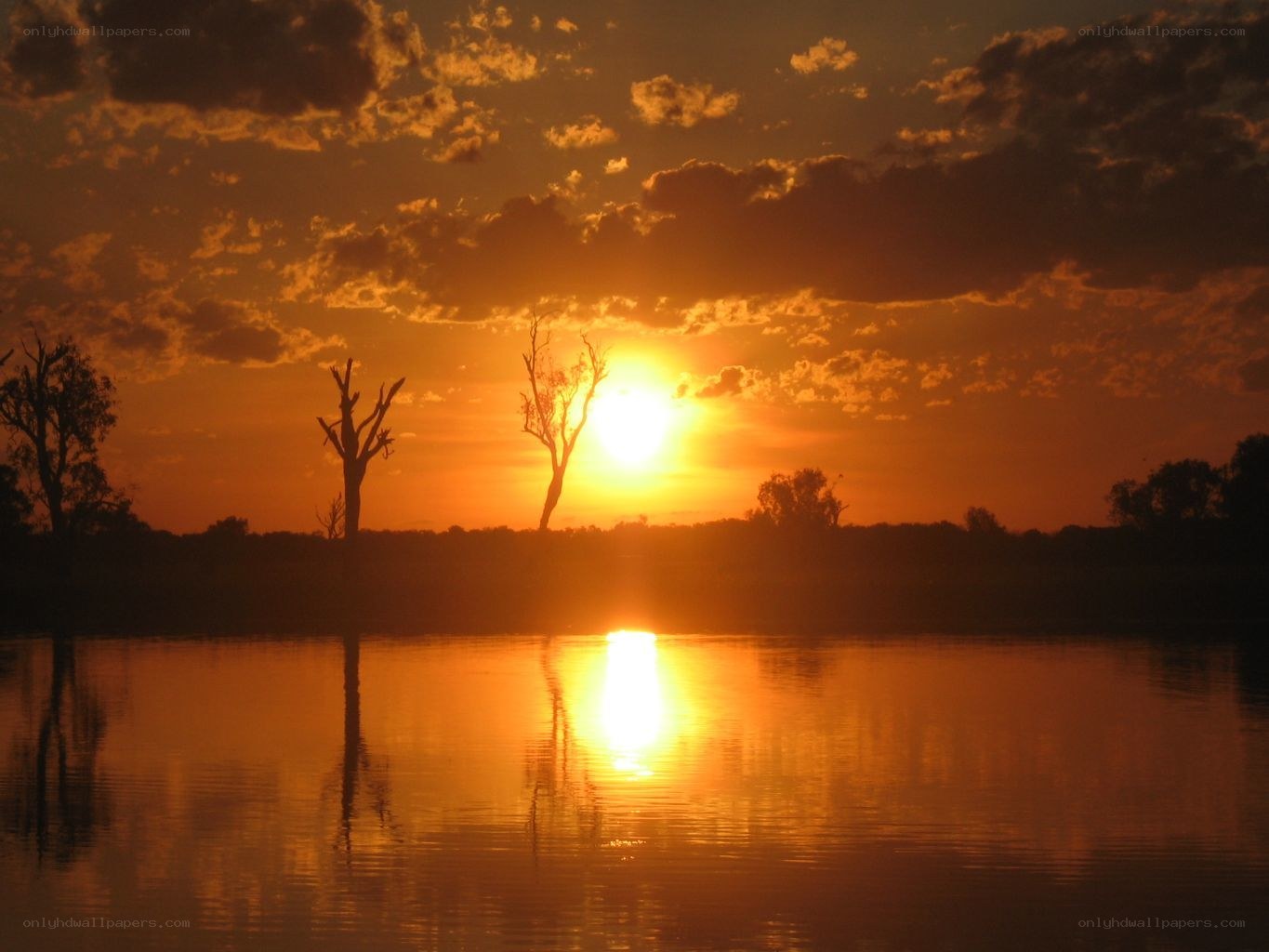 Sunset over a calm river