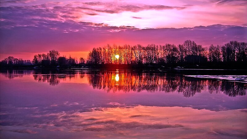 Sunset over a calm river
