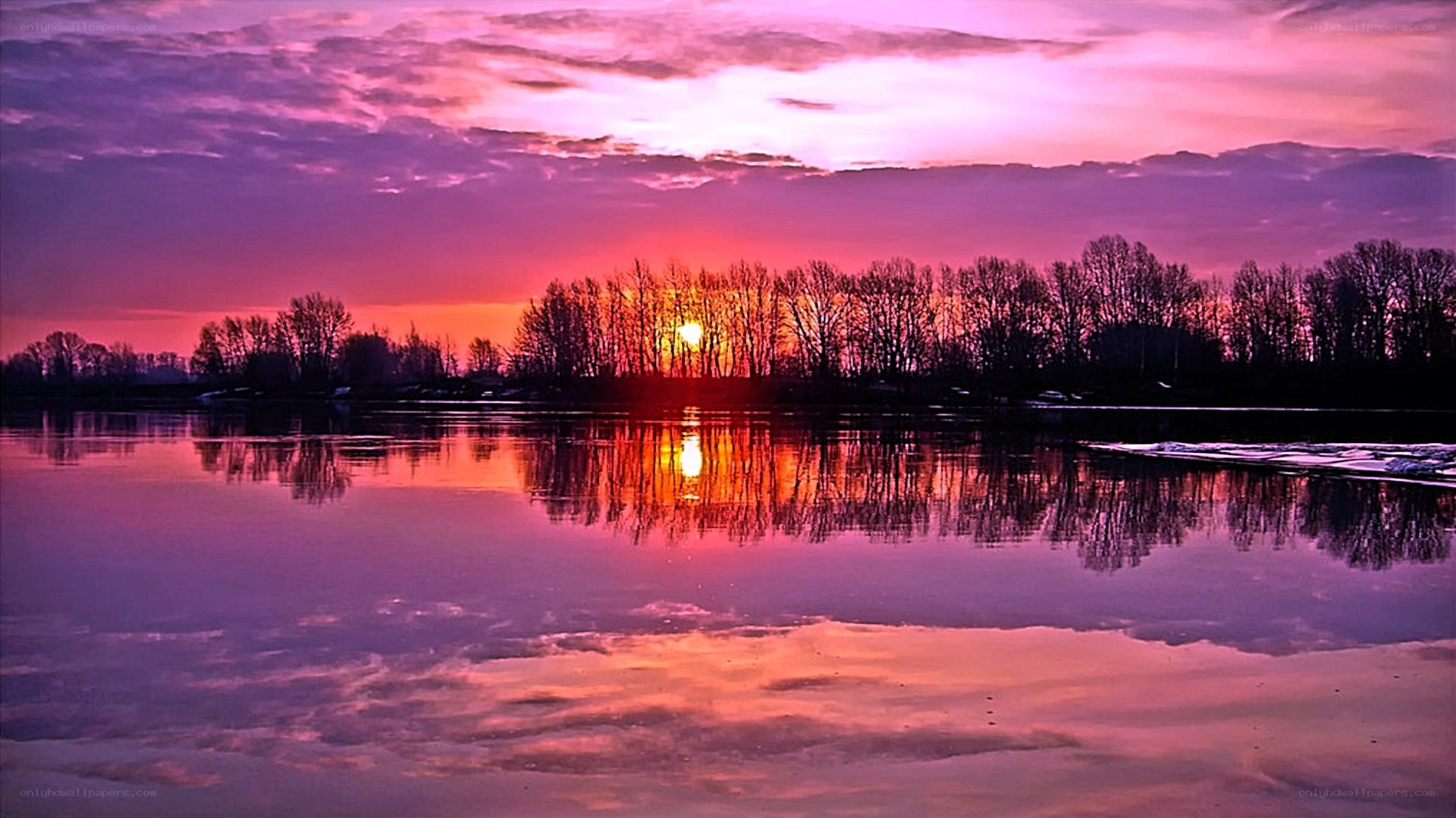 Sunset over a calm river