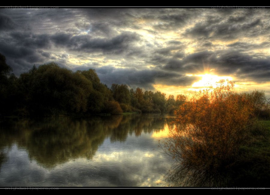 Sunset over a calm river