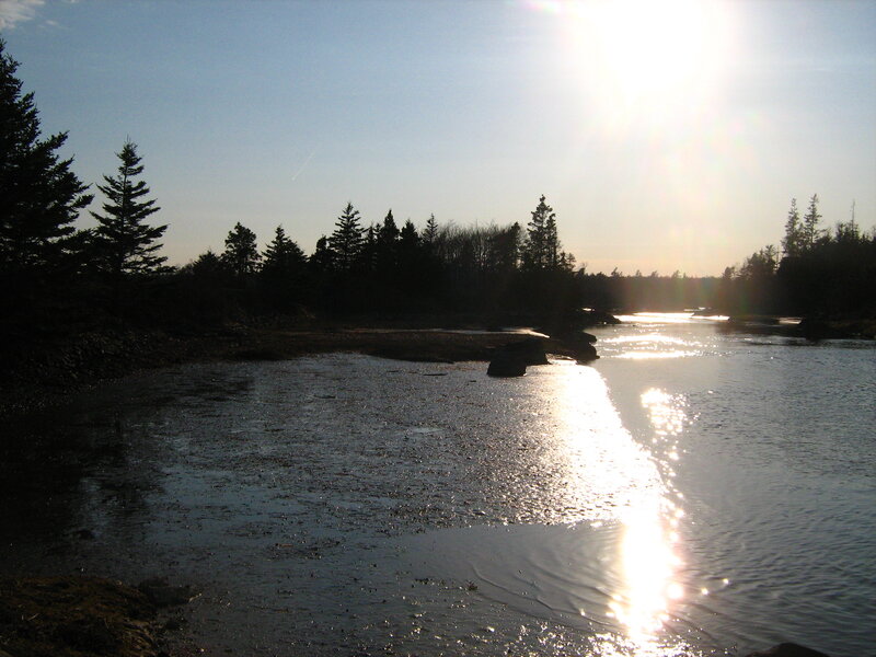 Sunset over a calm river