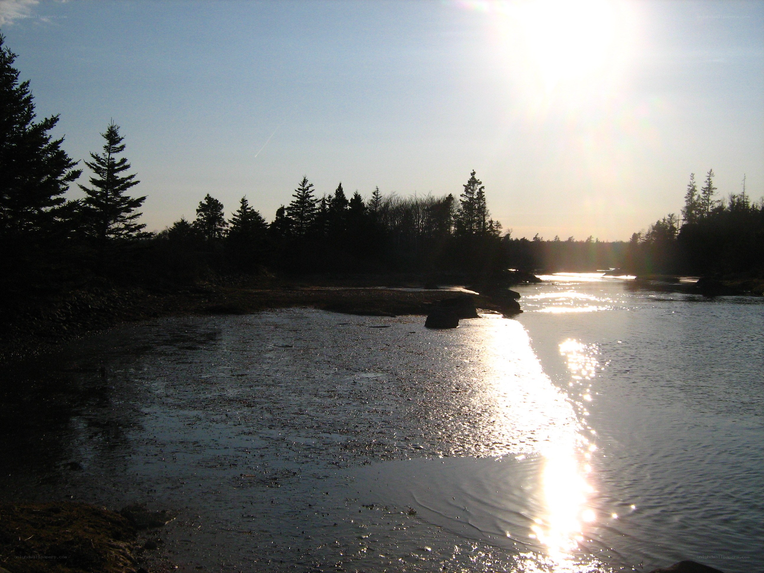 Sunset over a calm river