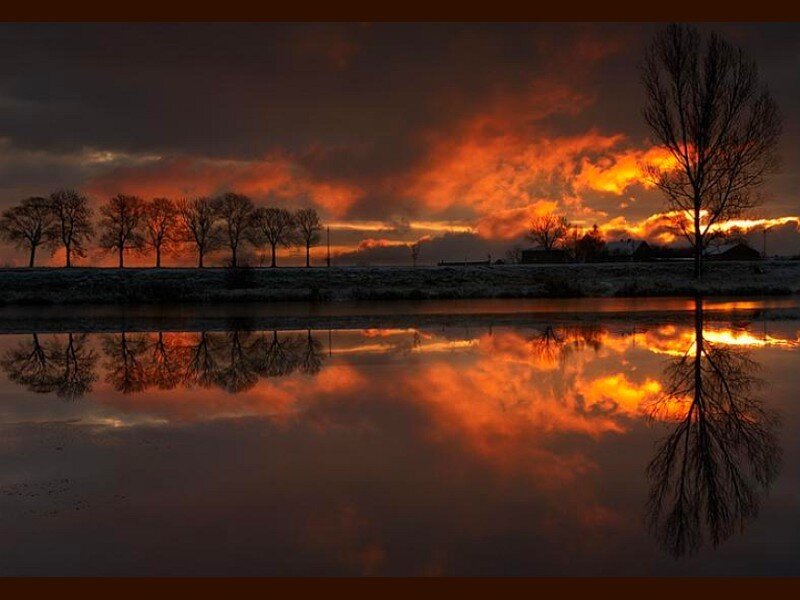 sunset over a calm river