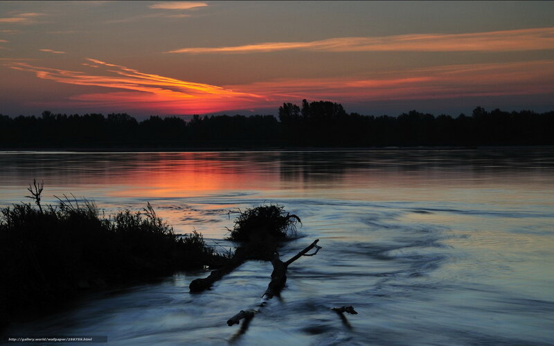 Sunset over a calm river