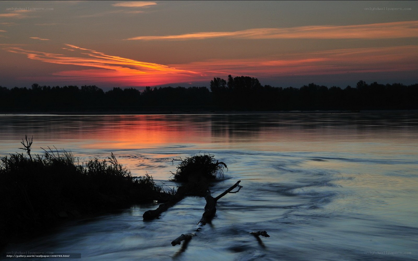 Sunset over a calm river