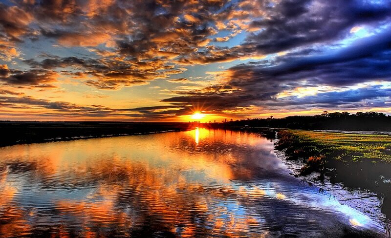 Sunset over a calm river