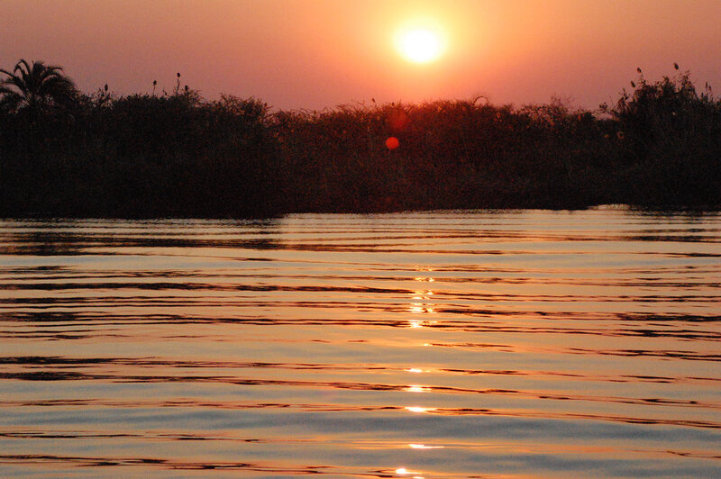 Sunset over a calm river