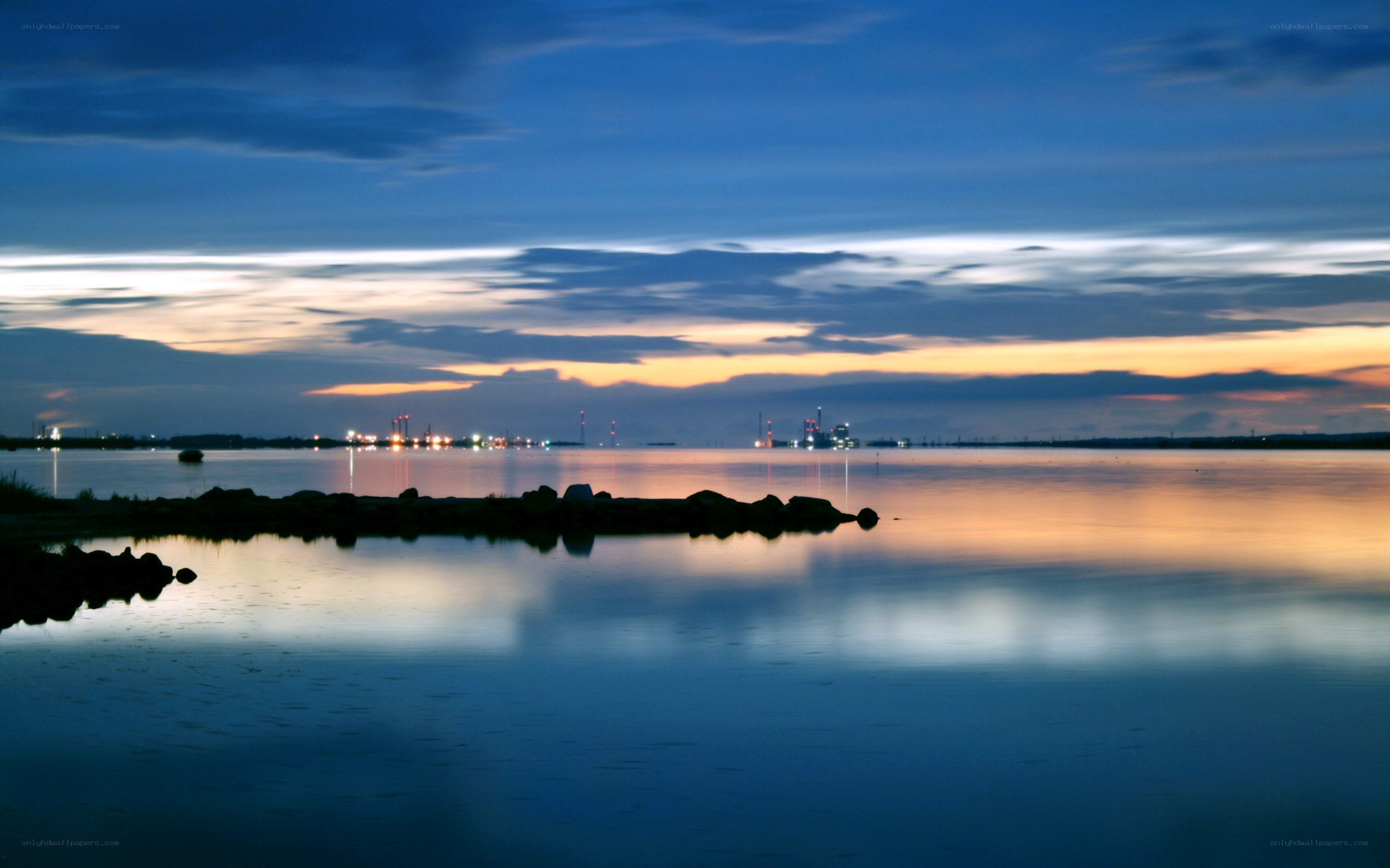 sunset over a calm waterway