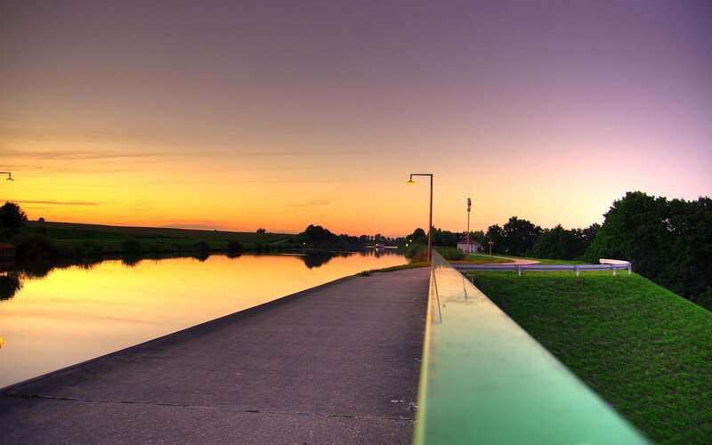 Sunset over a canal path