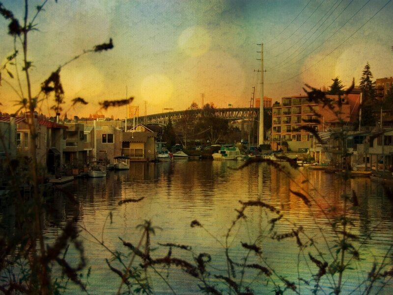 Sunset over a canal with houseboats