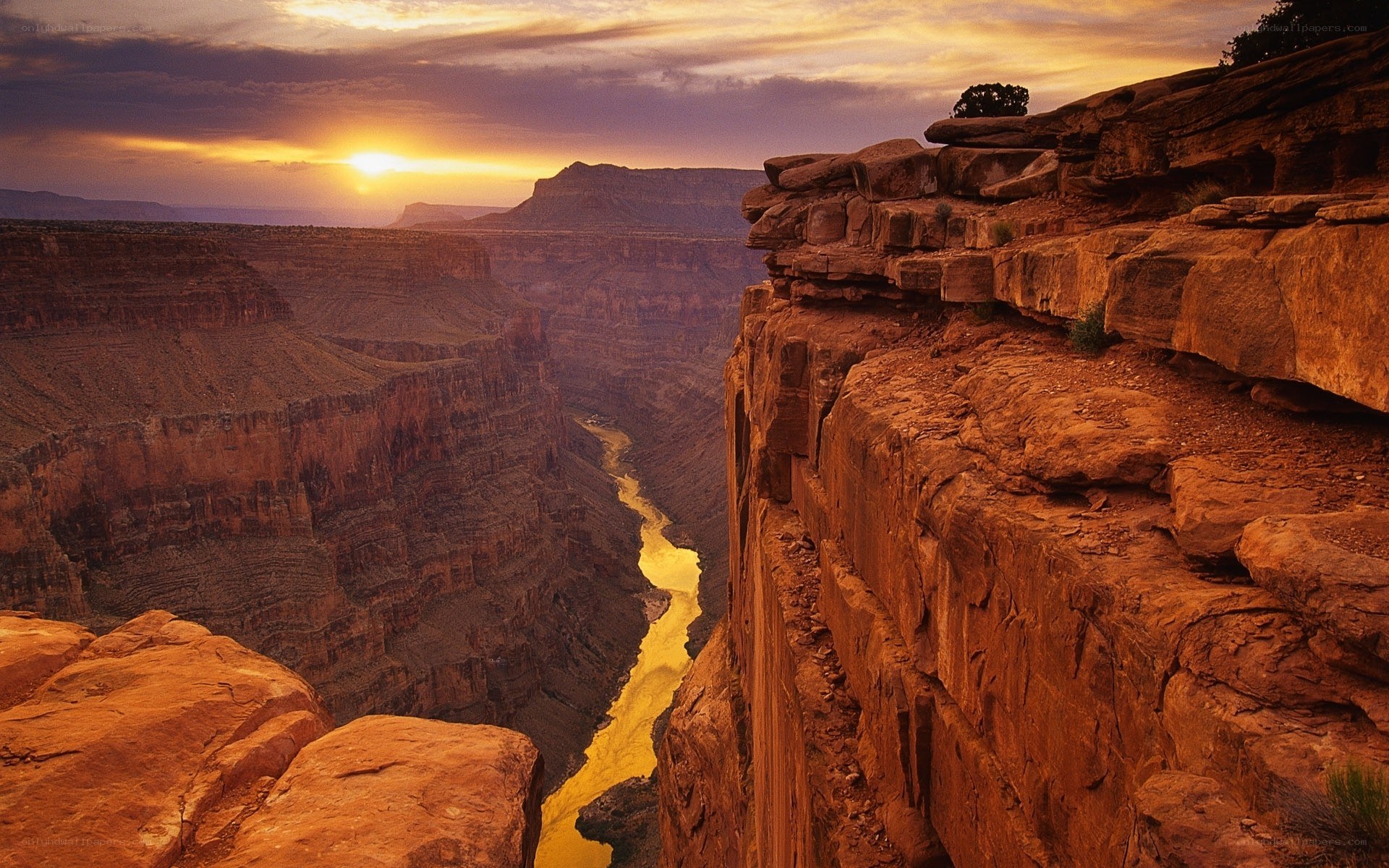 Sunset over a canyon river