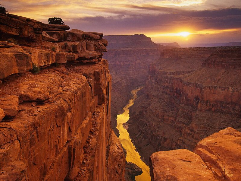 Sunset over a canyon river