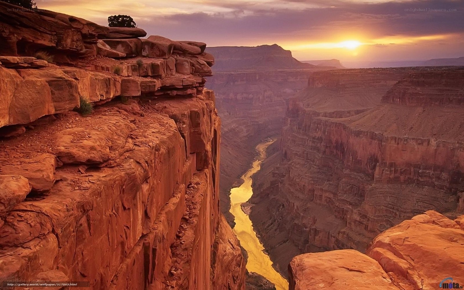 Sunset over a canyon river