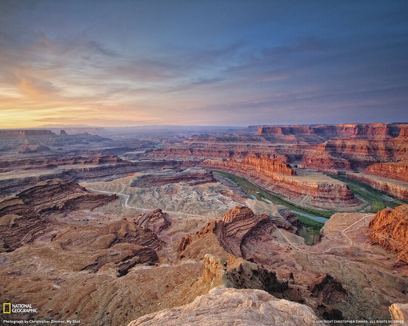 Sunset over a canyon river