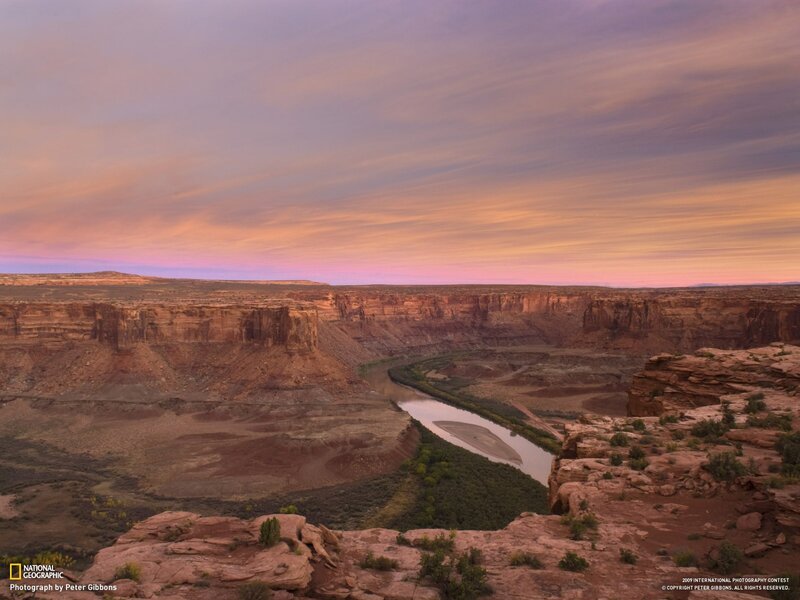 Sunset over a canyon river