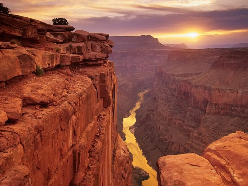 Sunset over a canyon river