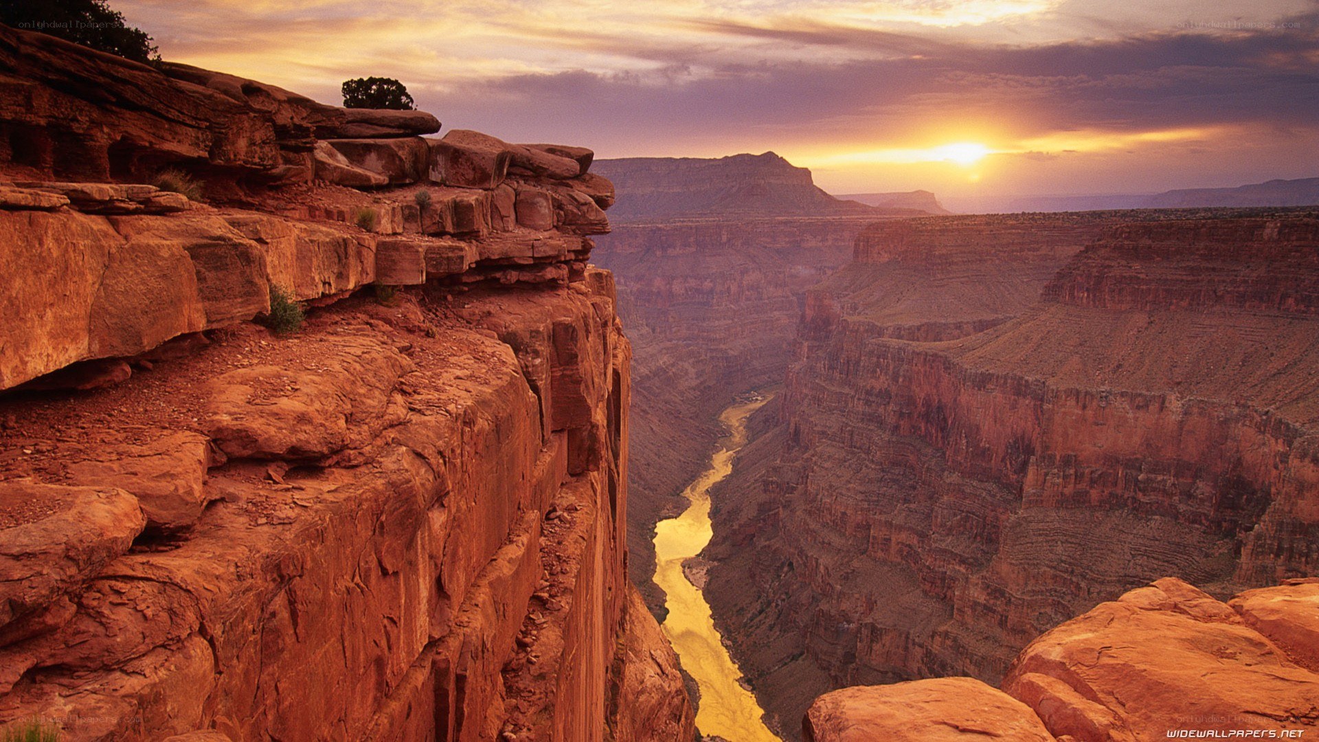Sunset over a canyon river