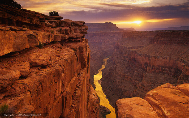 Sunset over a canyon river