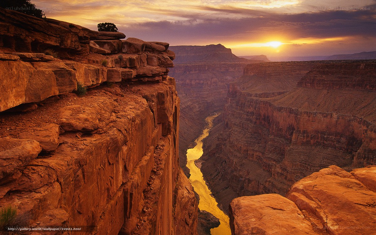Sunset over a canyon river