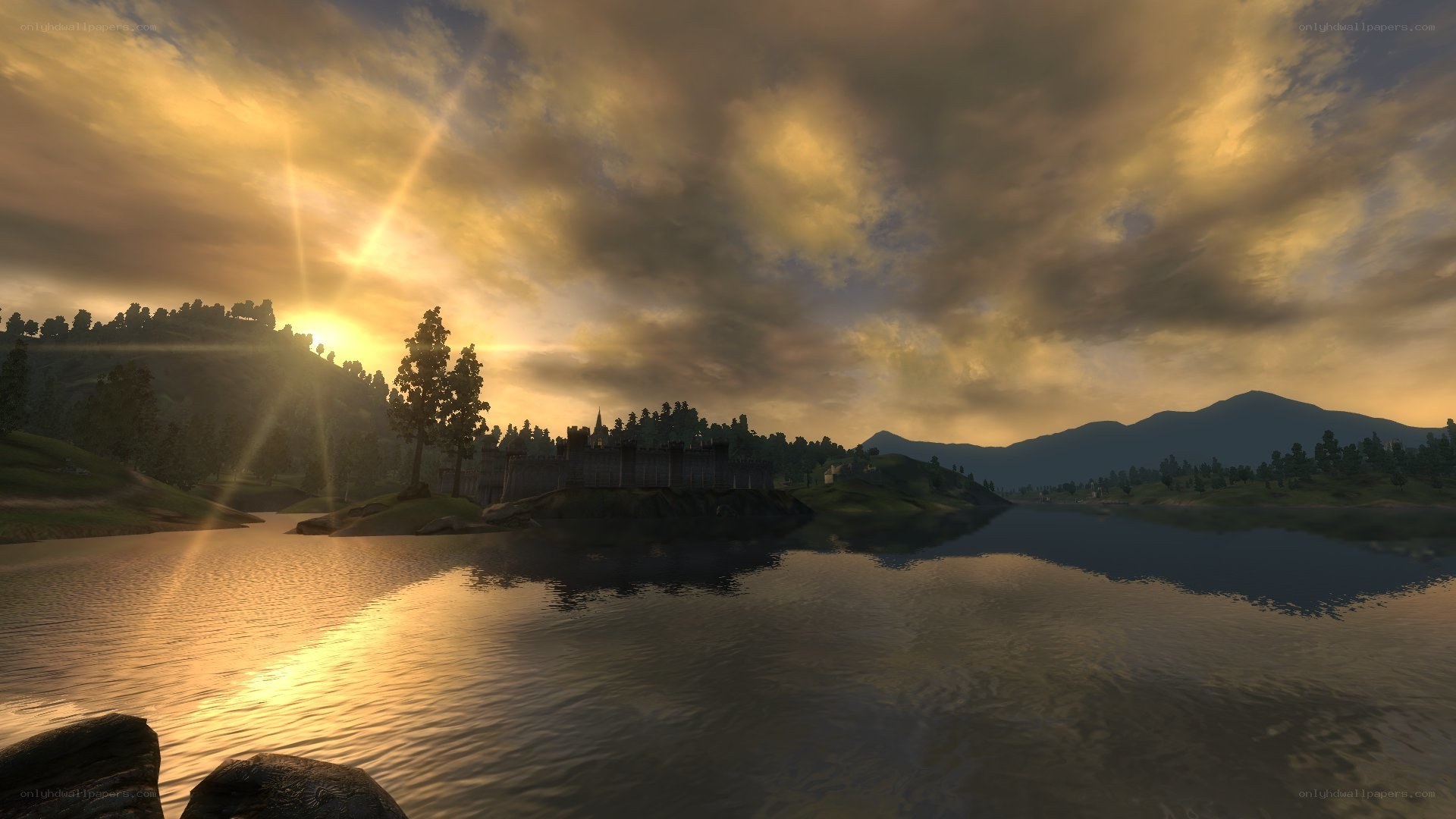 sunset over a castle by the lake