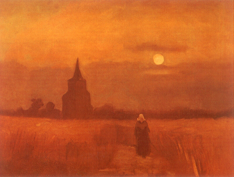 Sunset over a church field