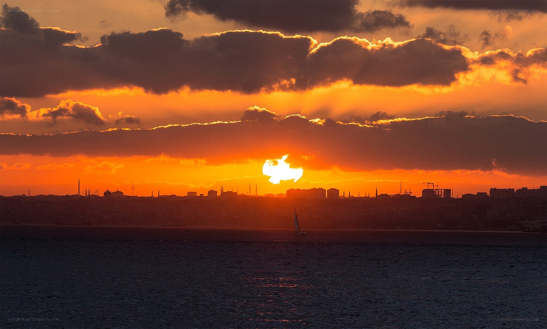 Sunset over a city skyline