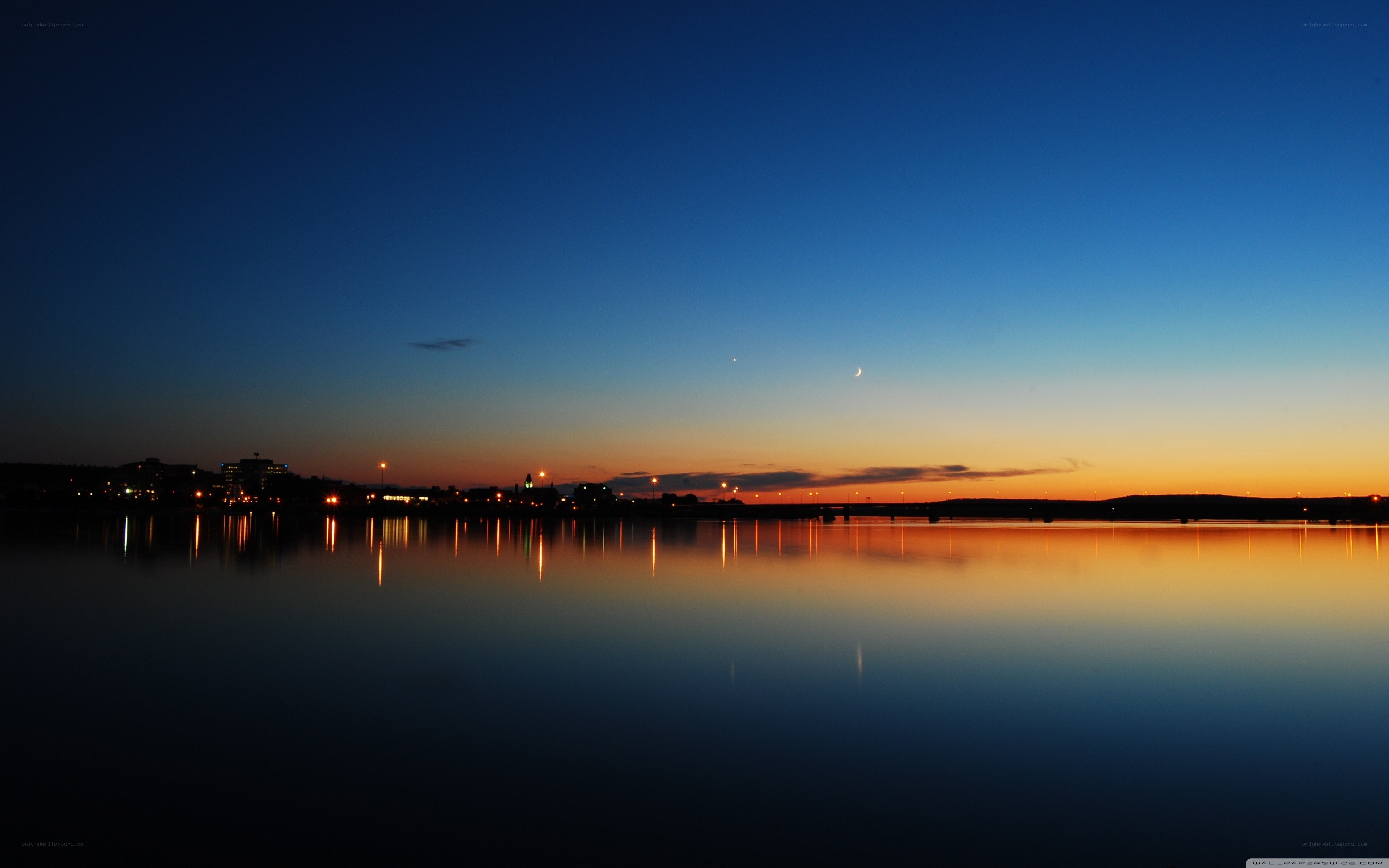 sunset over a city skyline