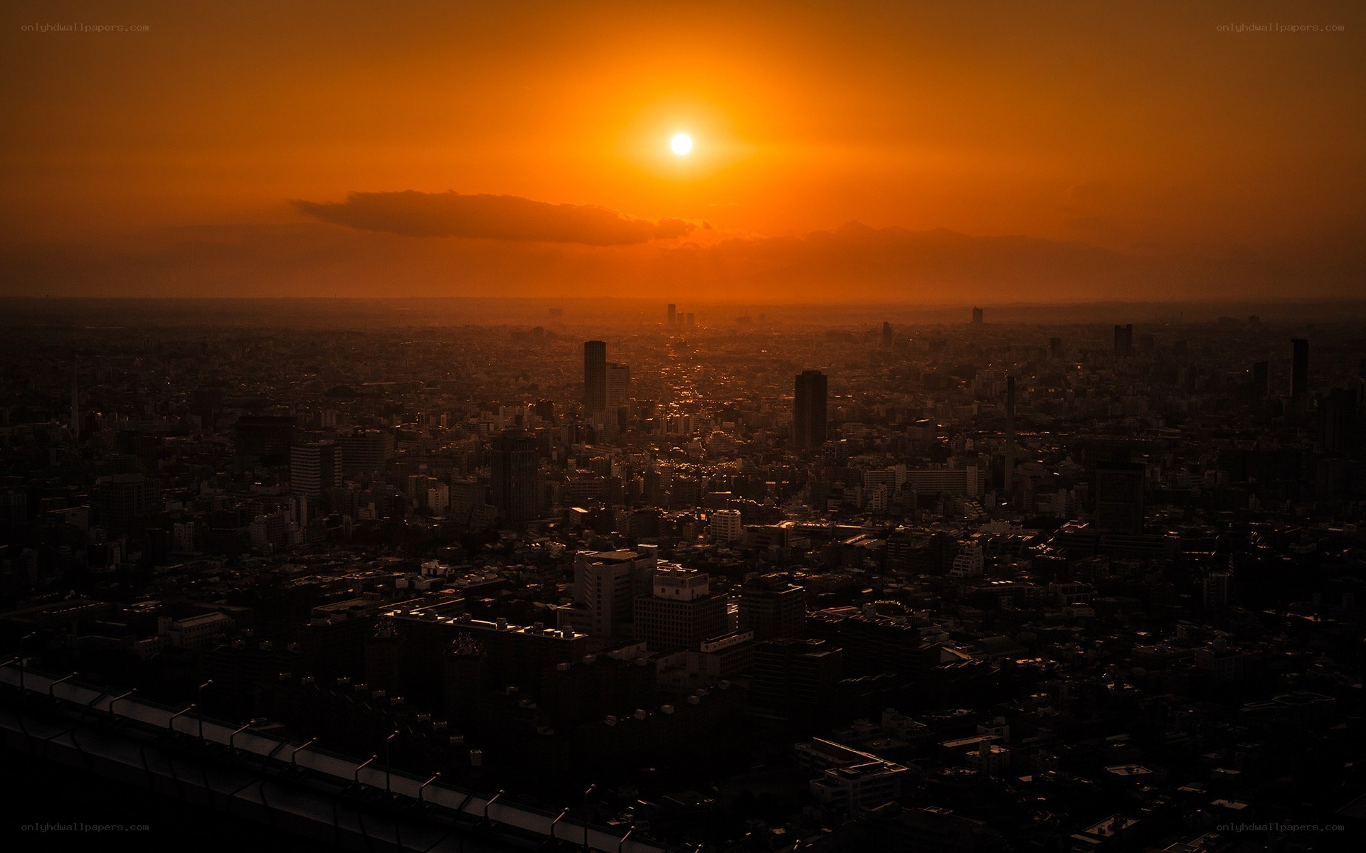Sunset over a city skyline