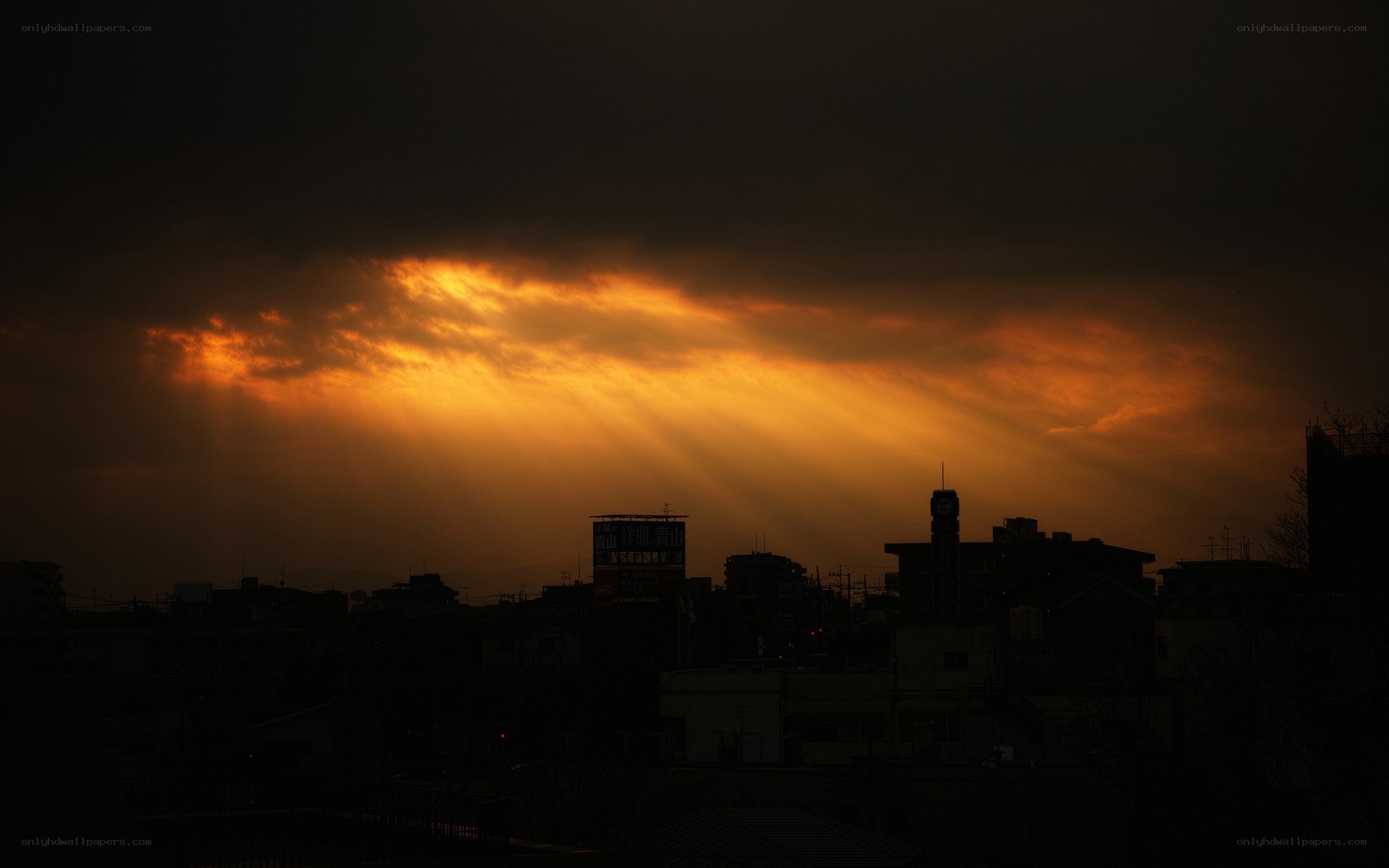 Sunset over a city skyline