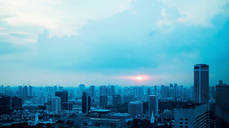 Sunset over a city skyline