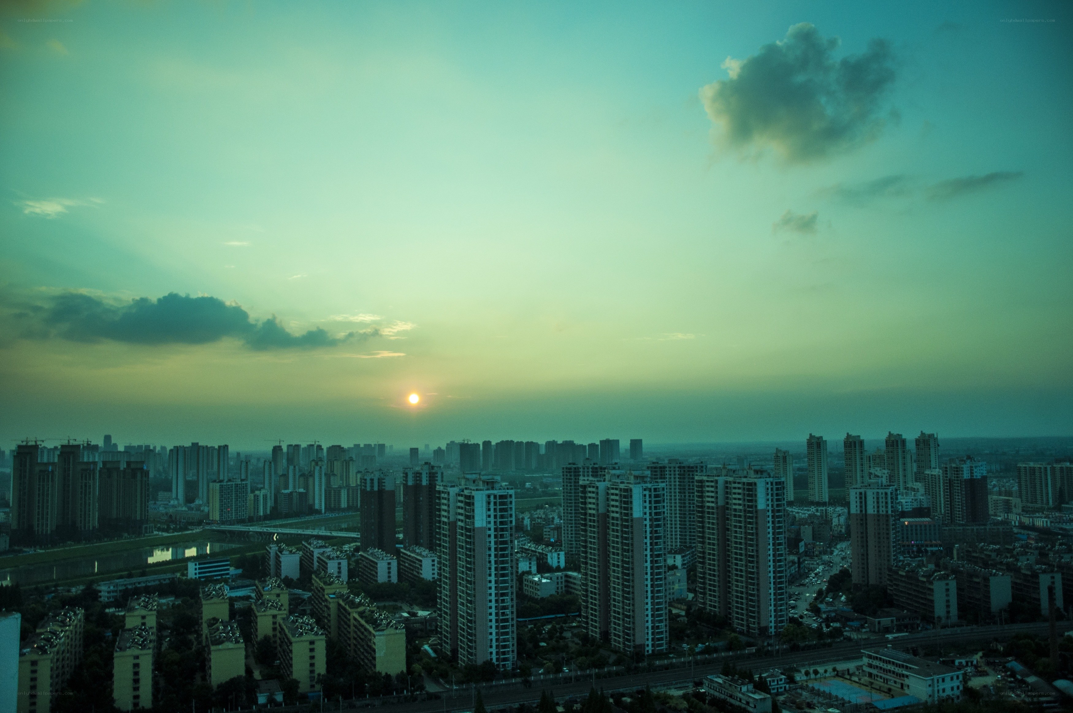 Sunset over a city skyline