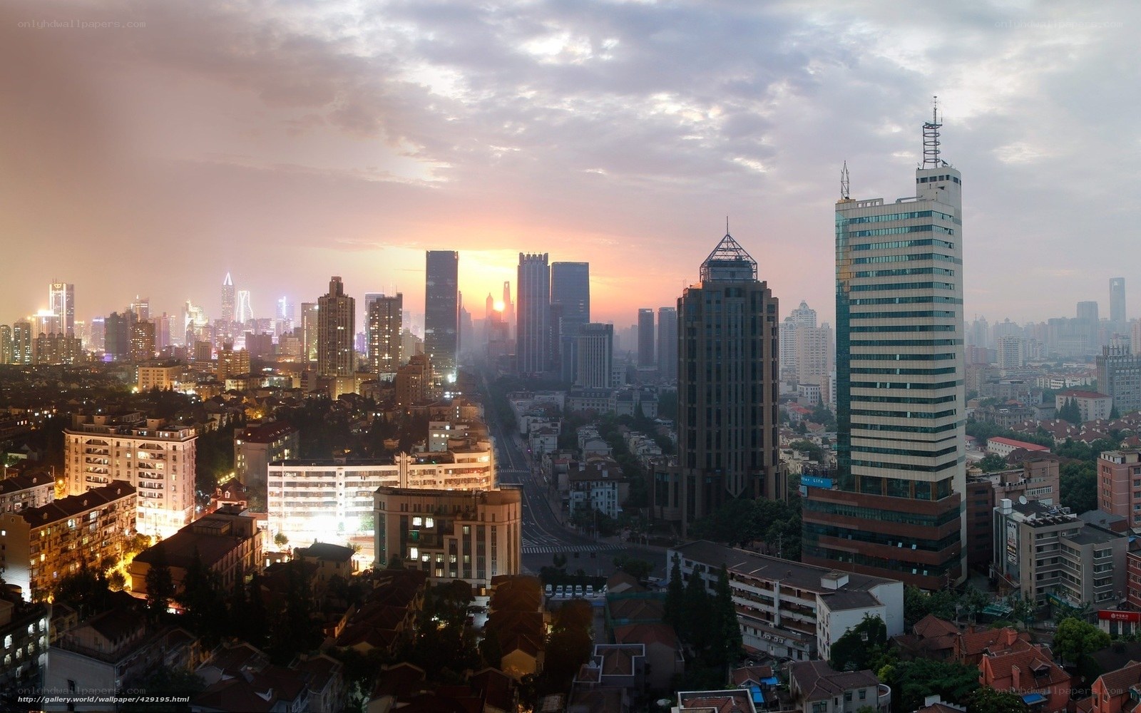 Sunset over a city skyline