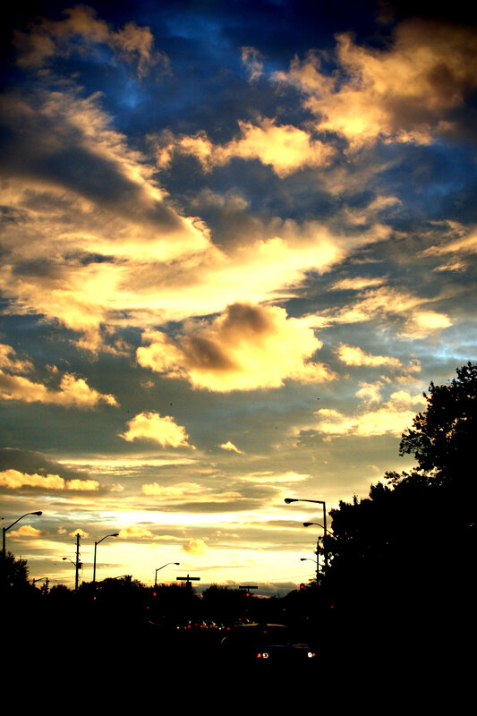 sunset over a city street