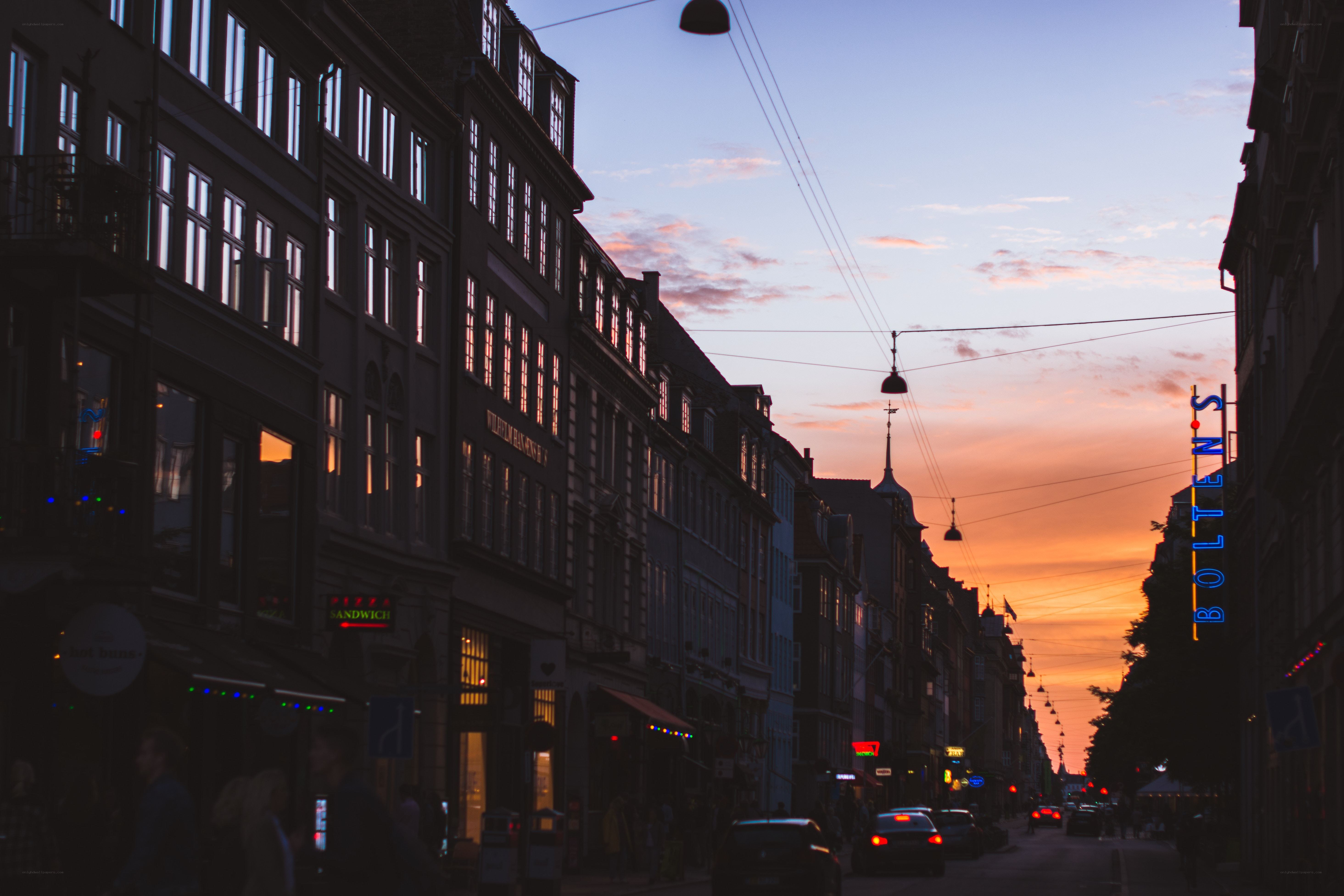 sunset over a city street