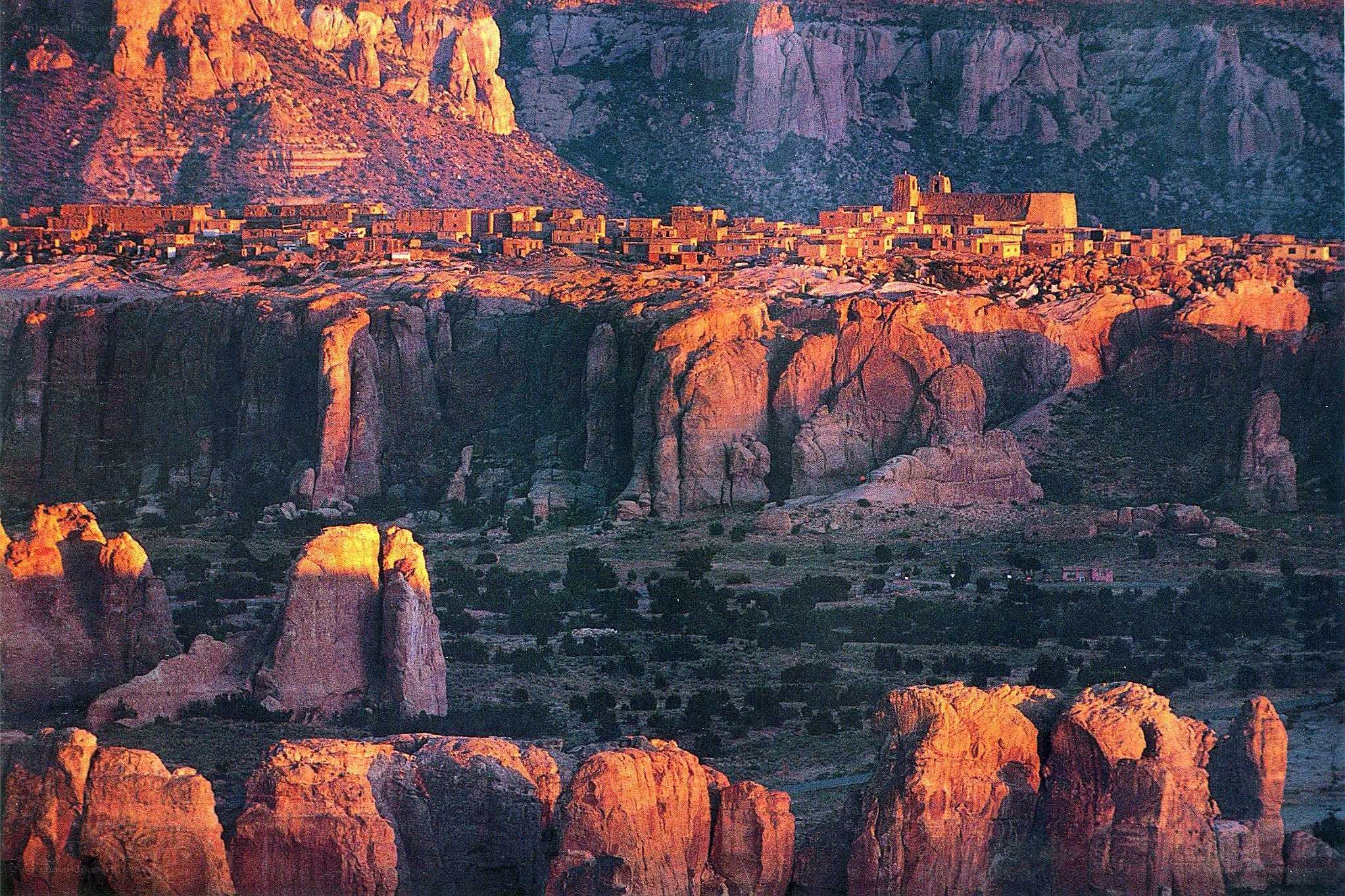 Sunset over a cliffside village
