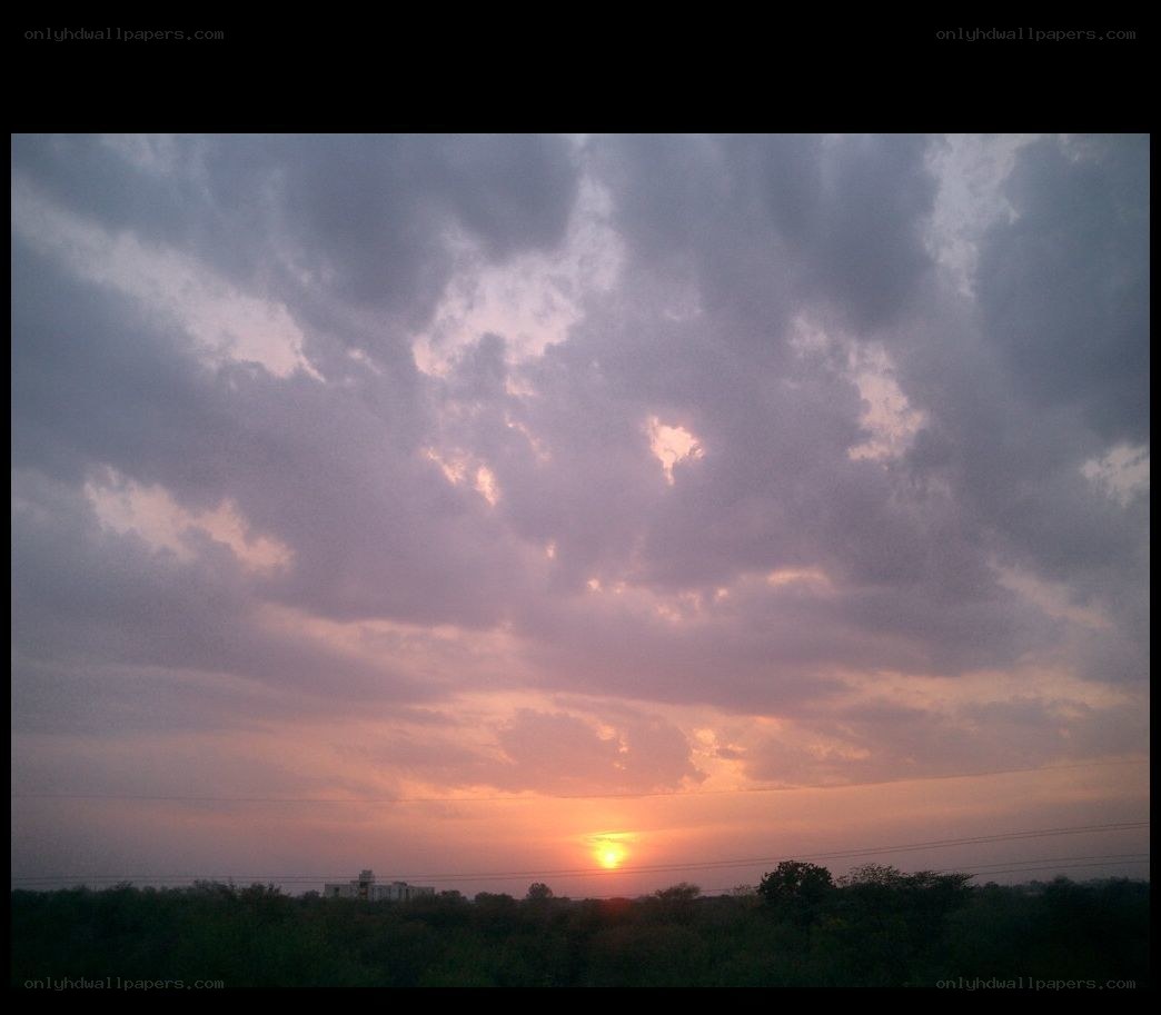 sunset over a cloudy sky