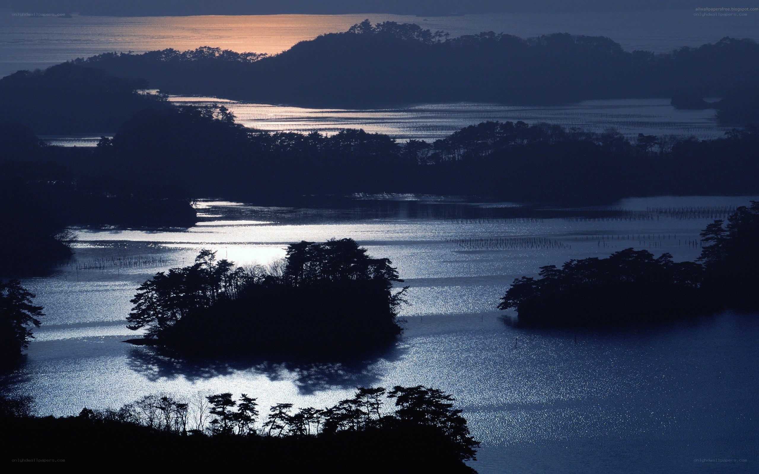 sunset over a coastal bay
