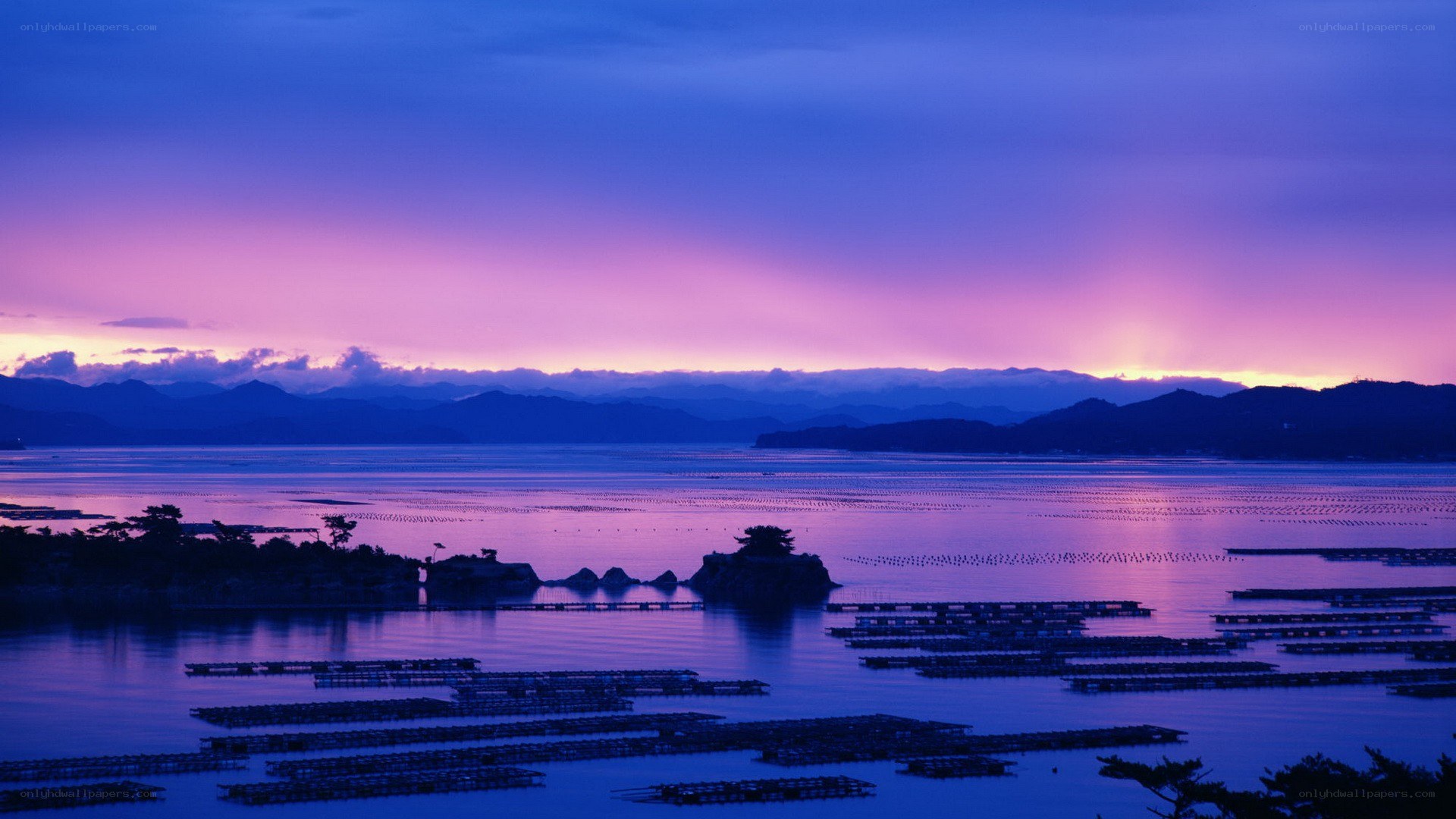 sunset over a coastal bay