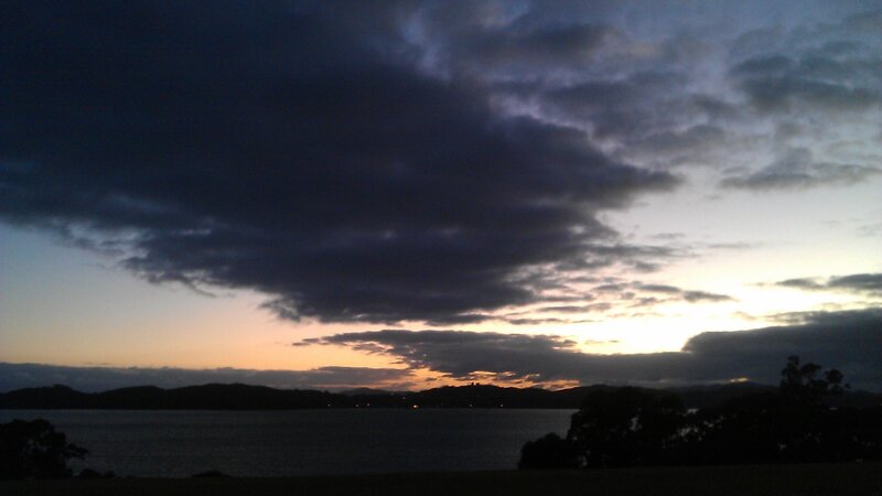 sunset over a coastal bay