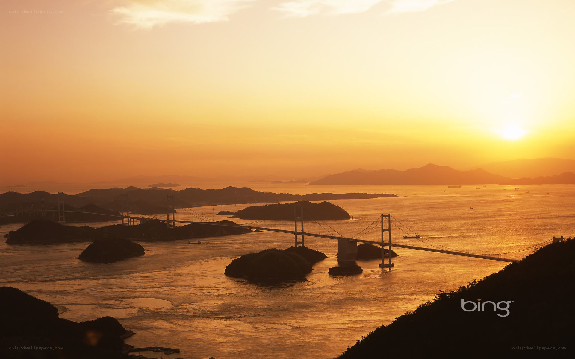 Sunset over a coastal bridge