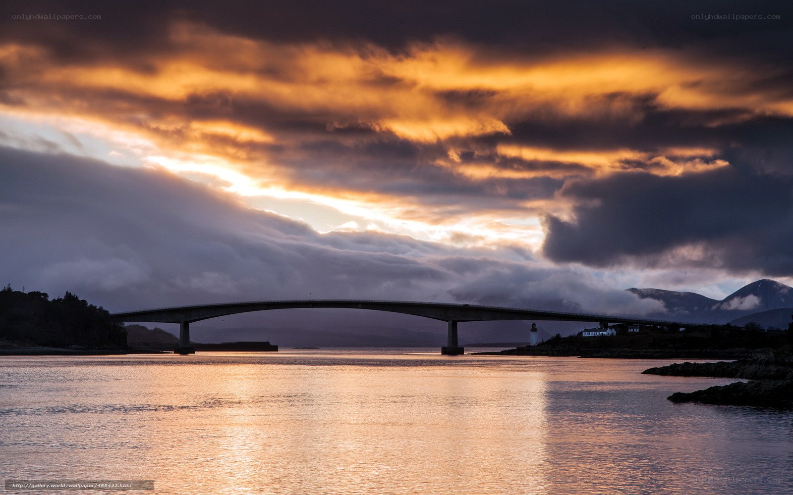 Sunset over a coastal bridge