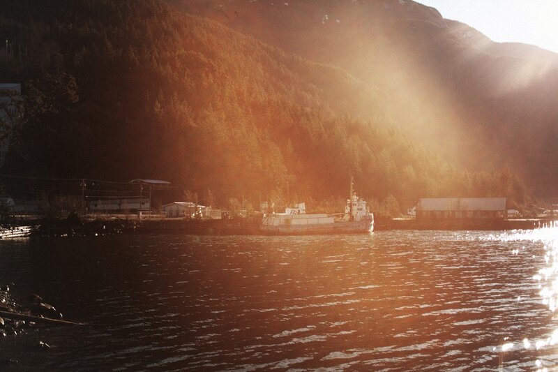 Sunset over a coastal harbor